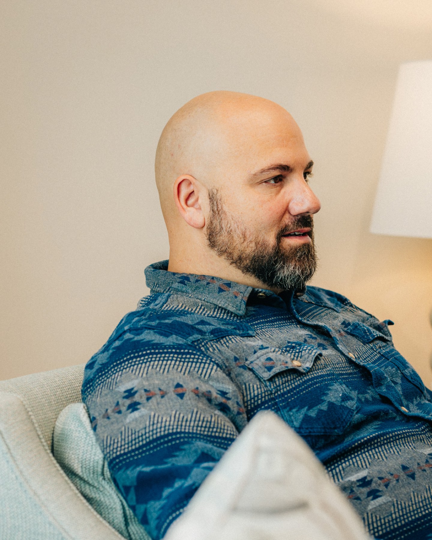 A provider listening closely in his counseling room